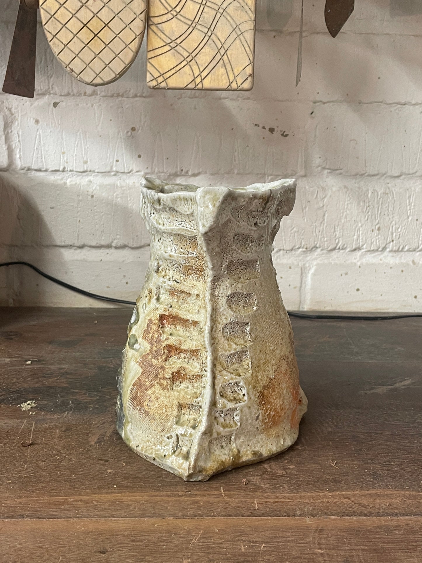 Outstanding hanaire, slab built with carving, Shigaraki yaki, unglazed woodfired stoneware, feldspar inclusions S087