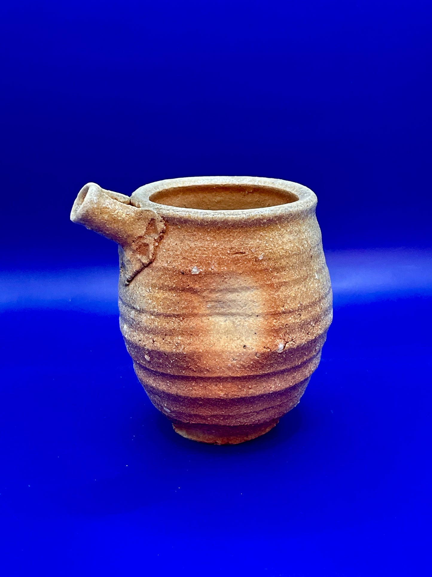Sauce or oil pourer, Shigaraki yaki, unglazed woodfired stoneware, feldspar inclusions. S036