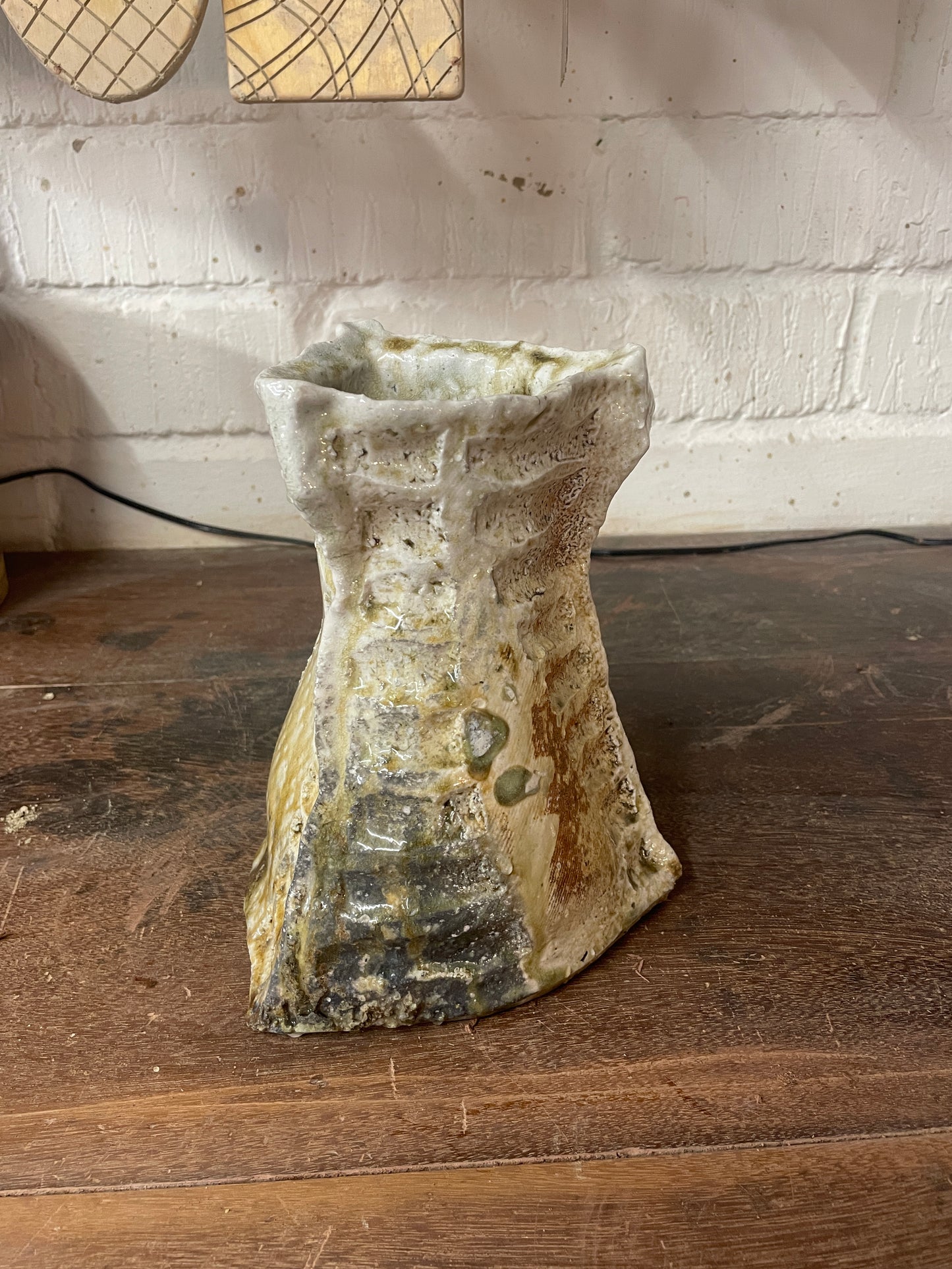 Outstanding hanaire, slab built with carving, Shigaraki yaki, unglazed woodfired stoneware, feldspar inclusions S087