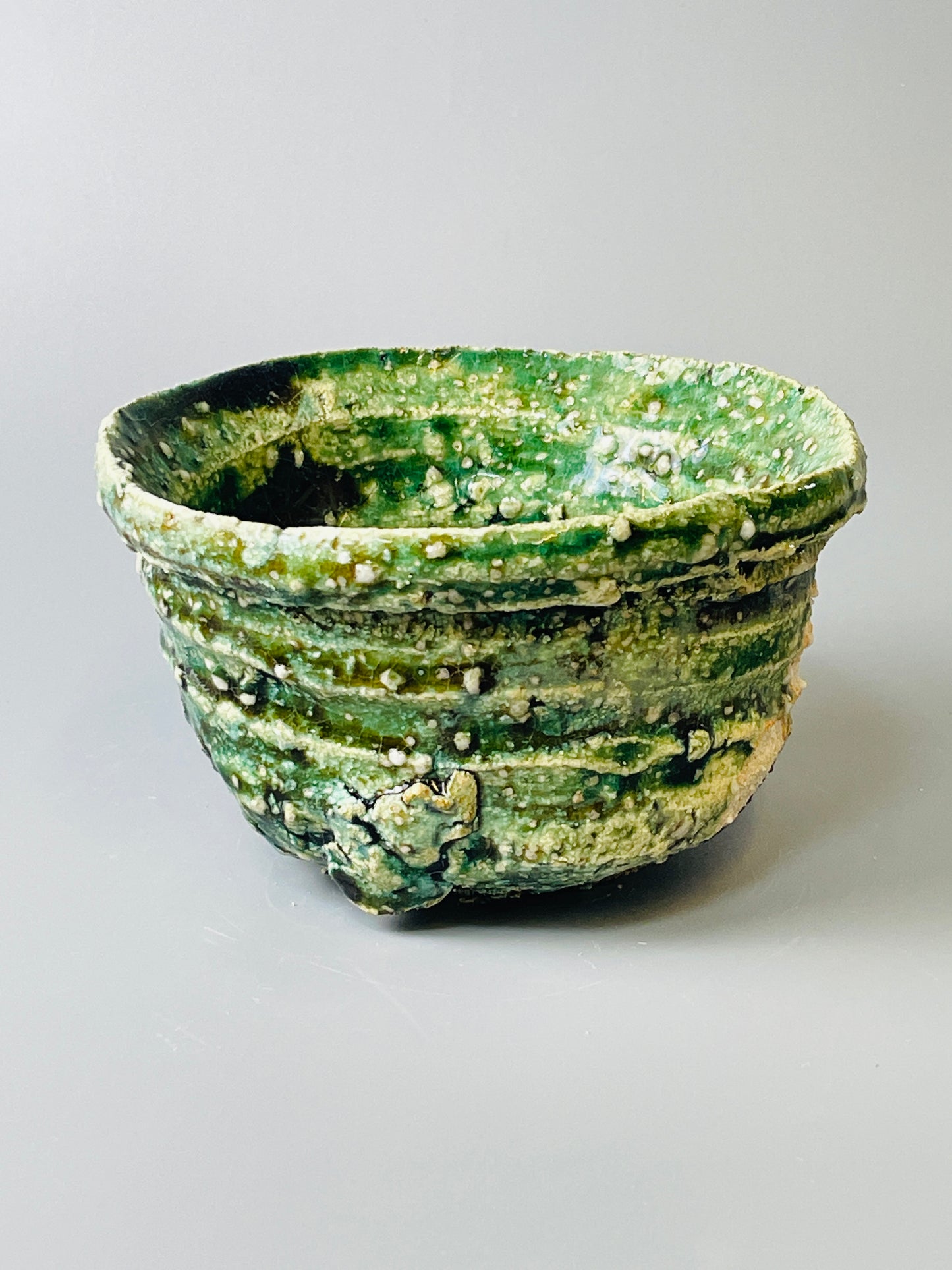 Shiga Oribe chawan, side fired, inclusion body, needle ash, personal marks for AA, A131