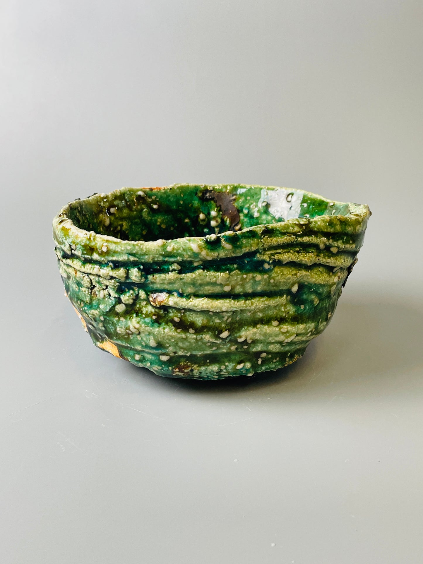 Shiga Oribe chawan, side fired, inclusion body, needle ash, personal marks for AA, A133