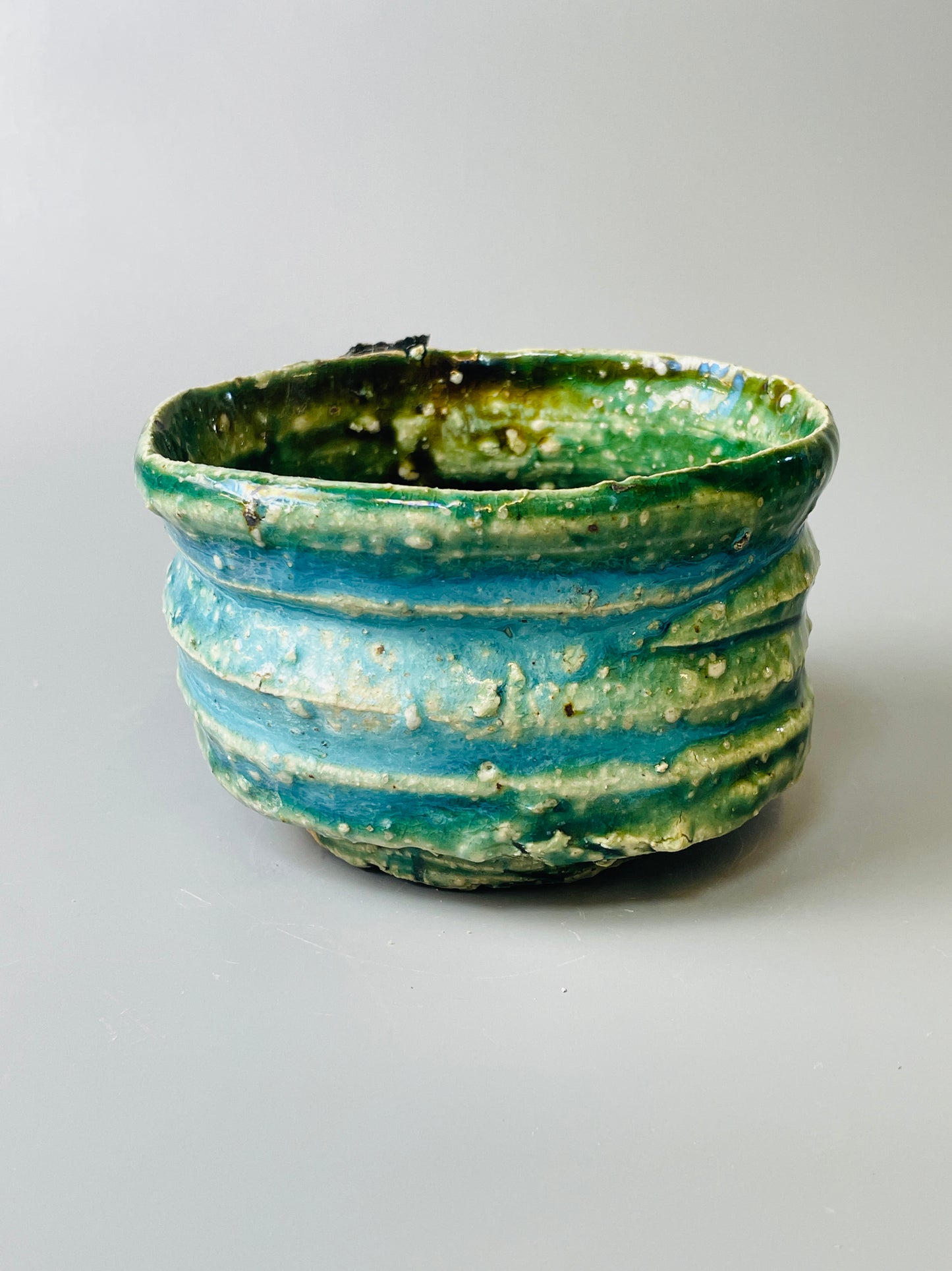 Shiga Oribe chawan, side fired, inclusion body, needle ash, personal marks for AA, A135