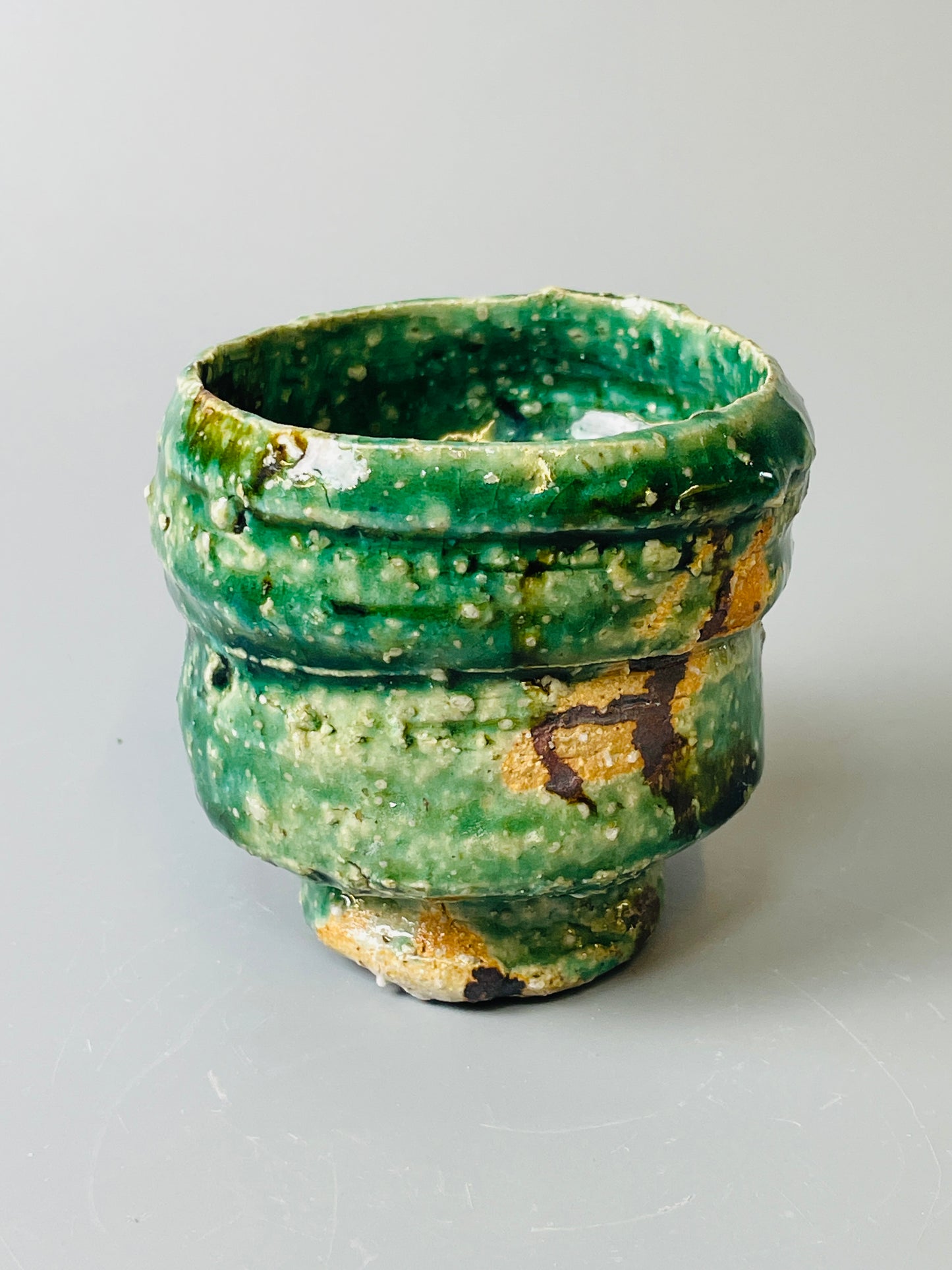 Shiga Oribe guinomi/espresso, side fired, inclusion body, needle ash, personal marks for AA, A142
