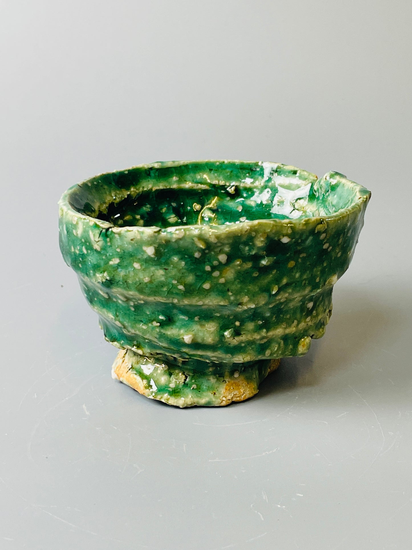 Shiga Oribe guinomi/espresso, side fired, inclusion body, needle ash, personal marks for AA, A144