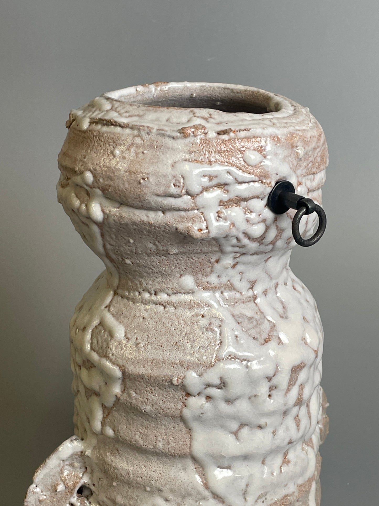 An Oni-Hagi hanging kake hanaire flower vase with iron fixture A180