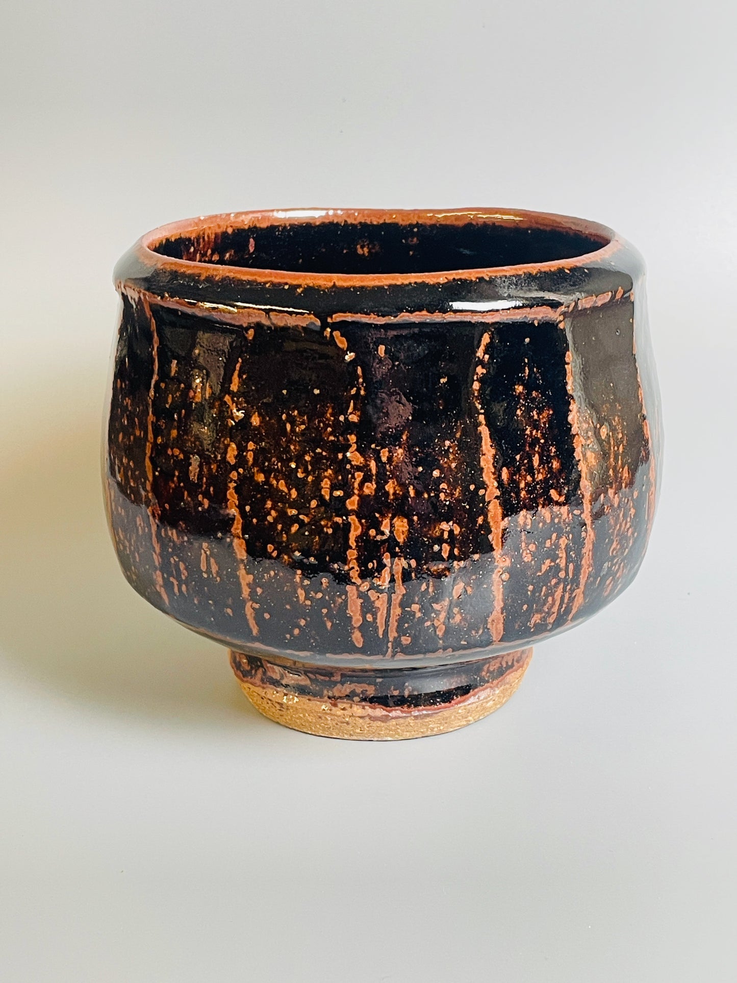 Medium faceted tall bowl, temmoku, T440