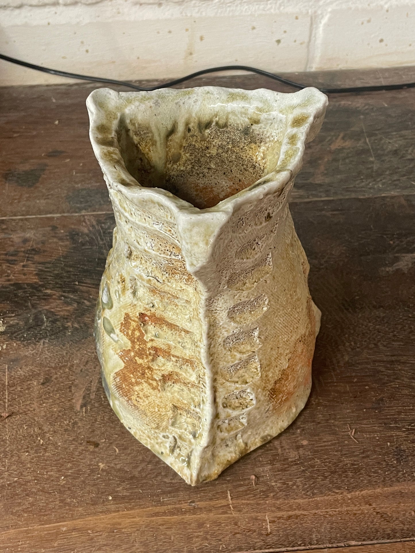 Outstanding hanaire, slab built with carving, Shigaraki yaki, unglazed woodfired stoneware, feldspar inclusions S087
