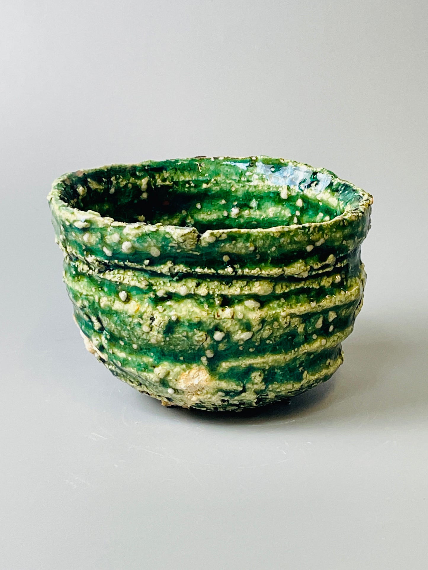Shiga Oribe chawan, side fired, inclusion body, needle ash, personal marks for AA, A132
