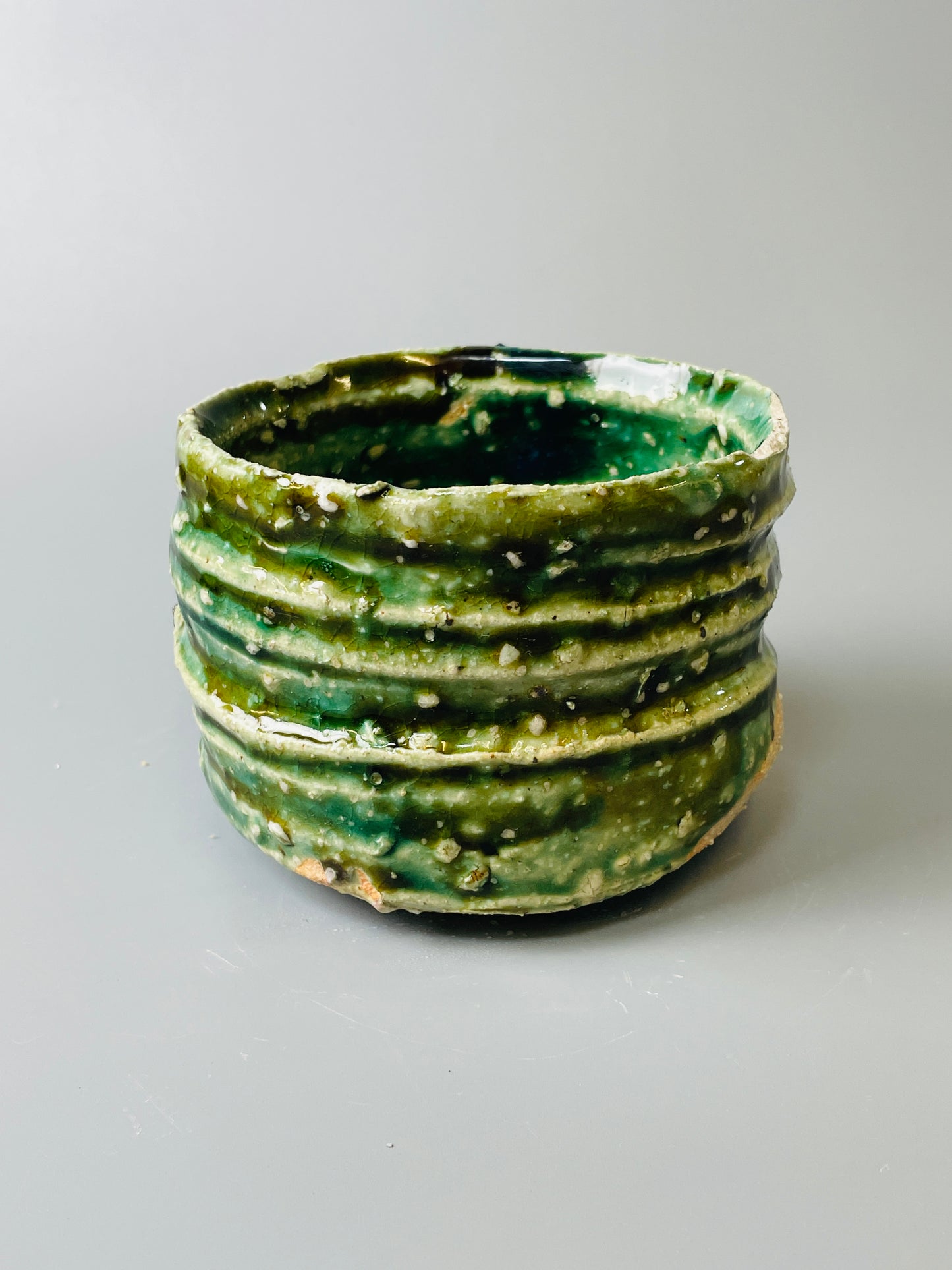 Shiga Oribe chawan, side fired, inclusion body, needle ash, personal marks for AA, A136