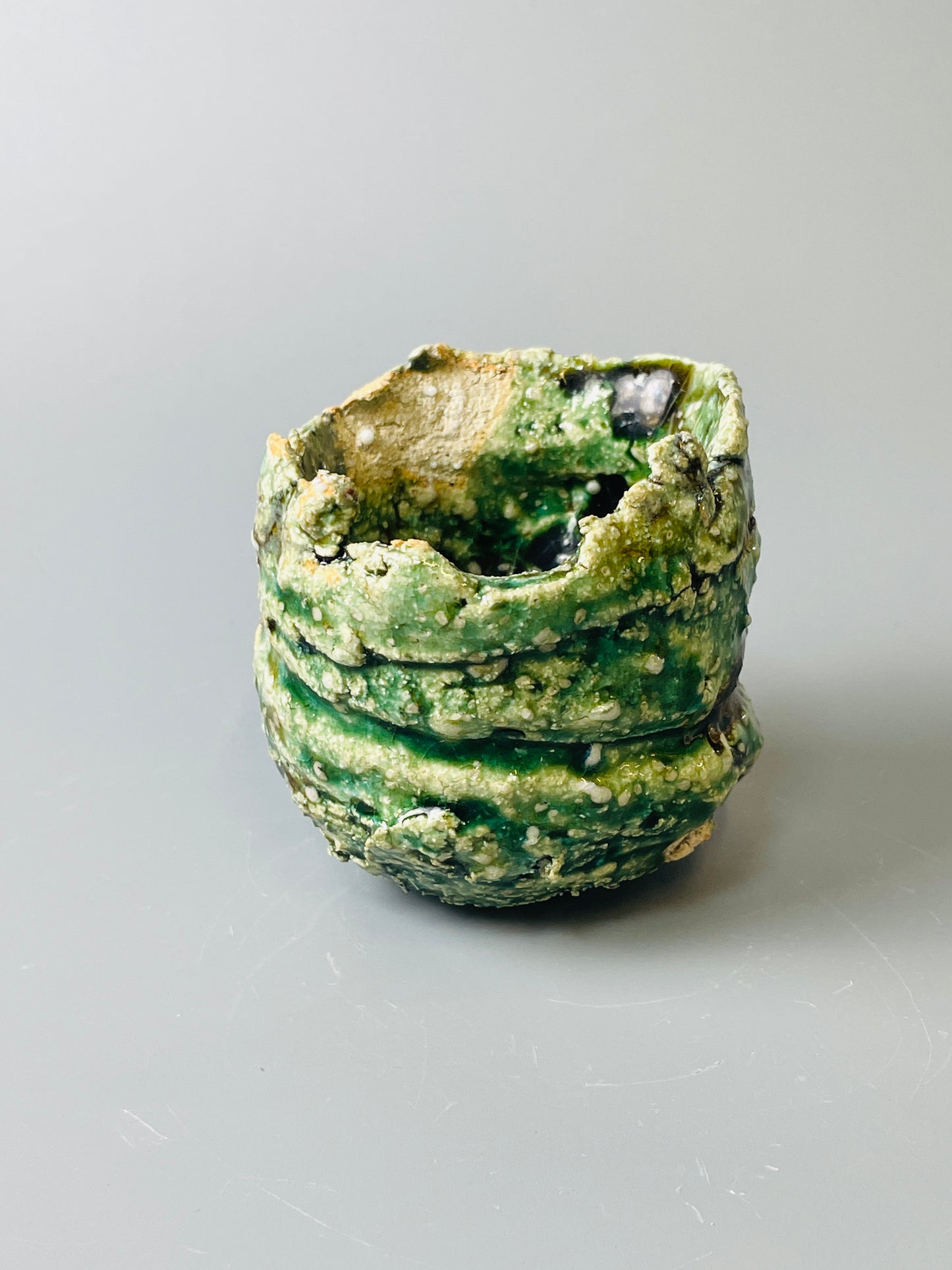 Shiga Oribe guinomi/espresso, side fired, inclusion body, needle ash, personal marks for AA, A138