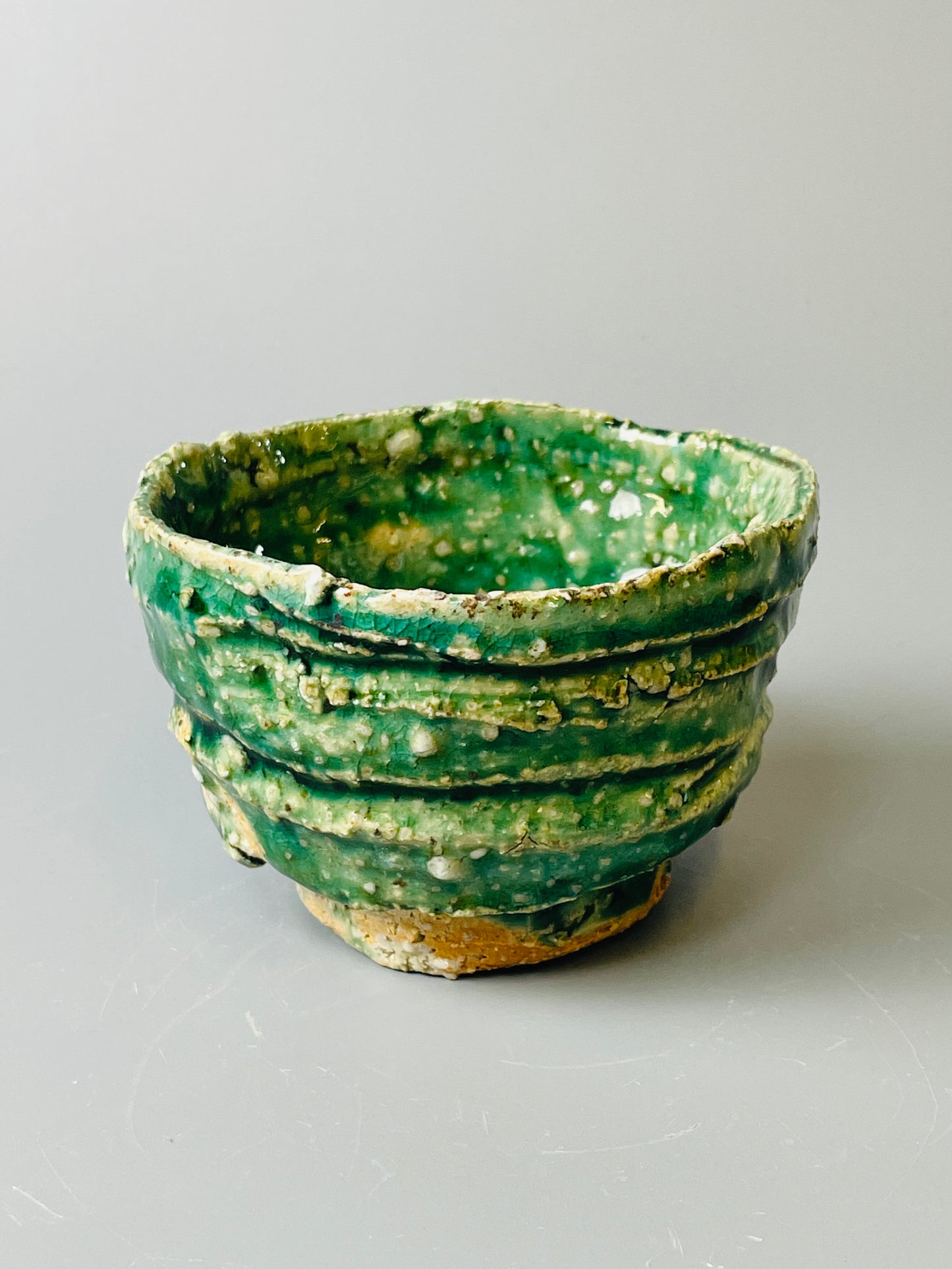 Shiga Oribe guinomi/espresso, side fired, inclusion body, needle ash, personal marks for AA, A140