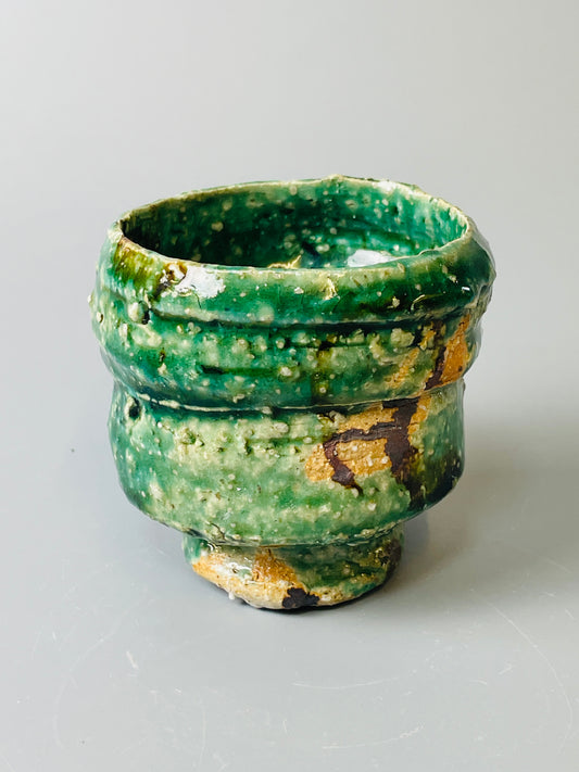 Shiga Oribe guinomi/espresso, side fired, inclusion body, needle ash, personal marks for AA, A142