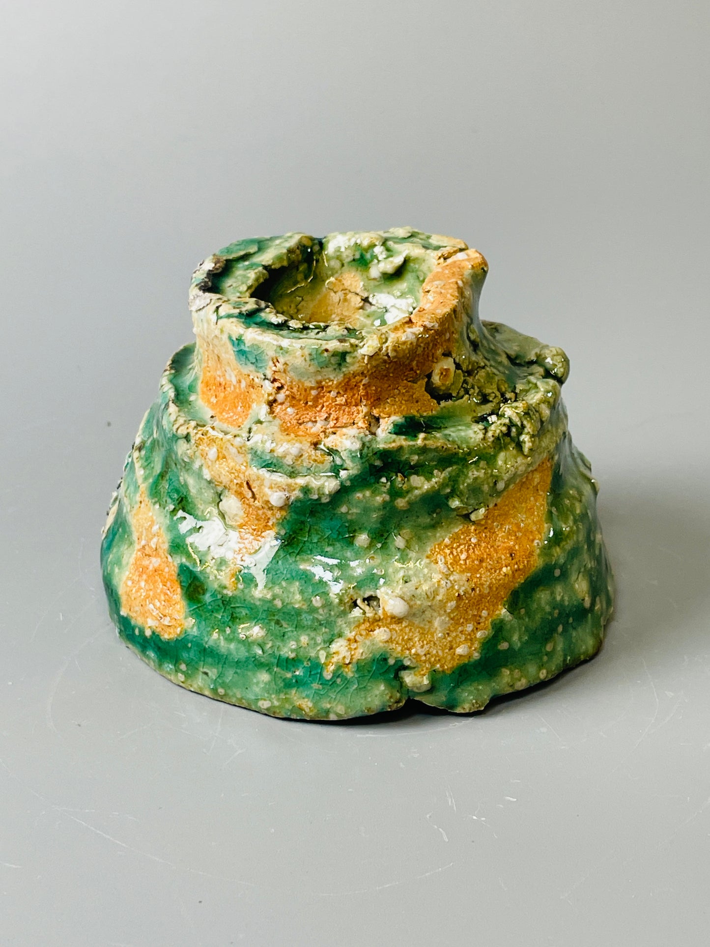 Shiga Oribe guinomi/espresso, side fired, inclusion body, needle ash, personal marks for AA, A144