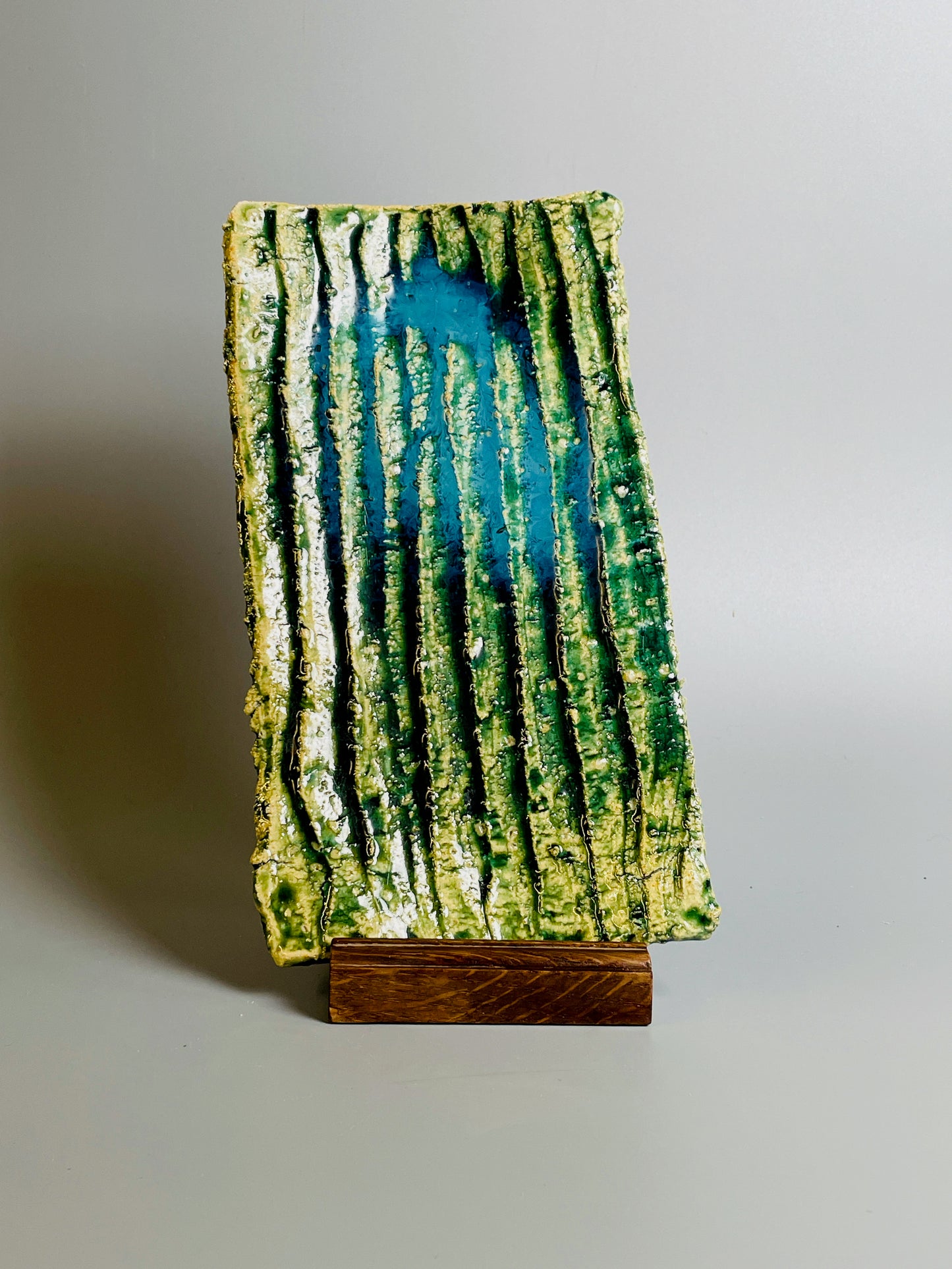 Aaron Angell for Troy Town, a small square oribe plate, feldspathic inclusions, A066